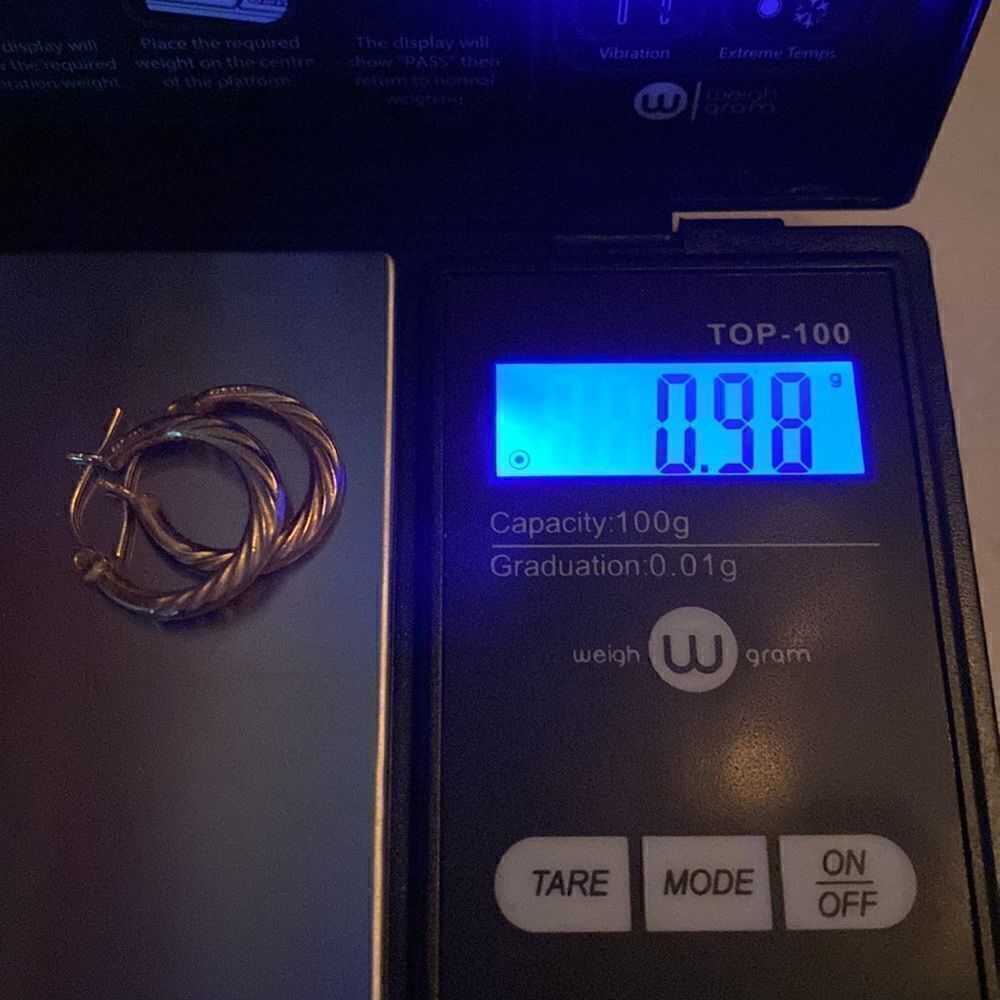 Classic 14k Gold Twisted Hoop Earrings
.98 grams - Picture 4 of 5